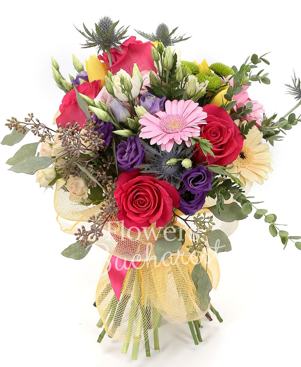 5 cyclam roses, 3 pink lisianthus, 3 mauve lisianthus, 5 yellow tulips, 2 eryngium, 3 cream gerbera, 2 pink gerbera, 3 cream miniroses, greenery