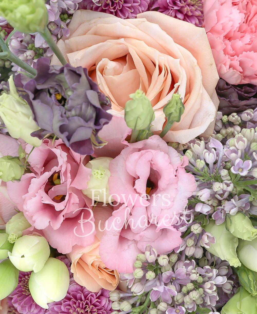 5 mauve lilac, 10 peach roses, 5 mauve lisianthus, 3 pink lisianthus, 5 pink carnations, 3 pink santini, 1 white hydrangea, greenery