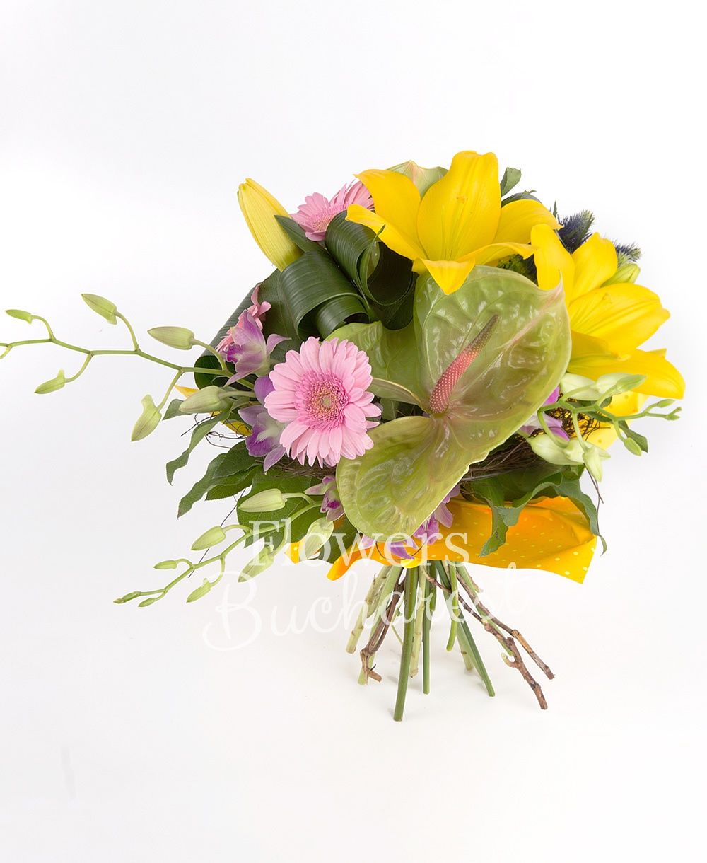 2 yellow lilies, 2 green anthurium, 3 pink gerbera, 5 pink dendrobium orchids, 2 eryngium, greenery