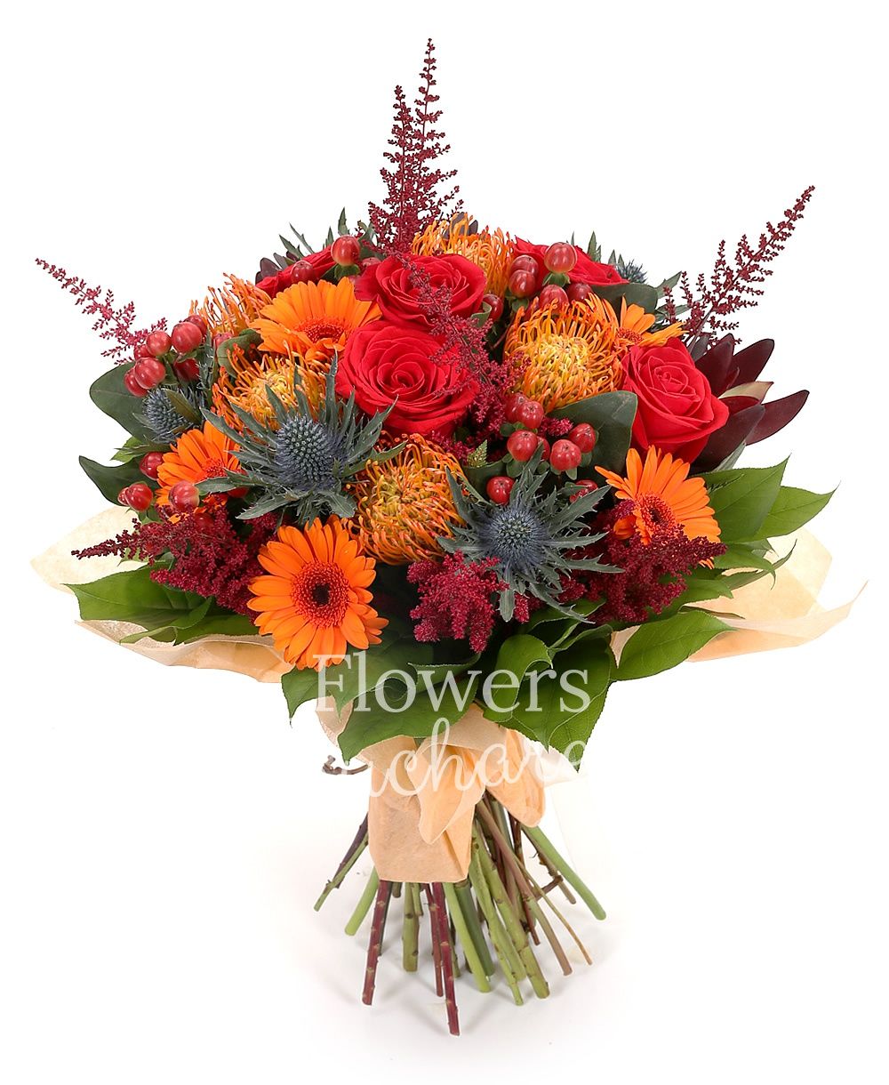 5 leucospermum, 3 eryngium, 8 astilbe, 7 orange gerberas, 7 red roses, 5 red hypericum, 5 leucadendron, greenery