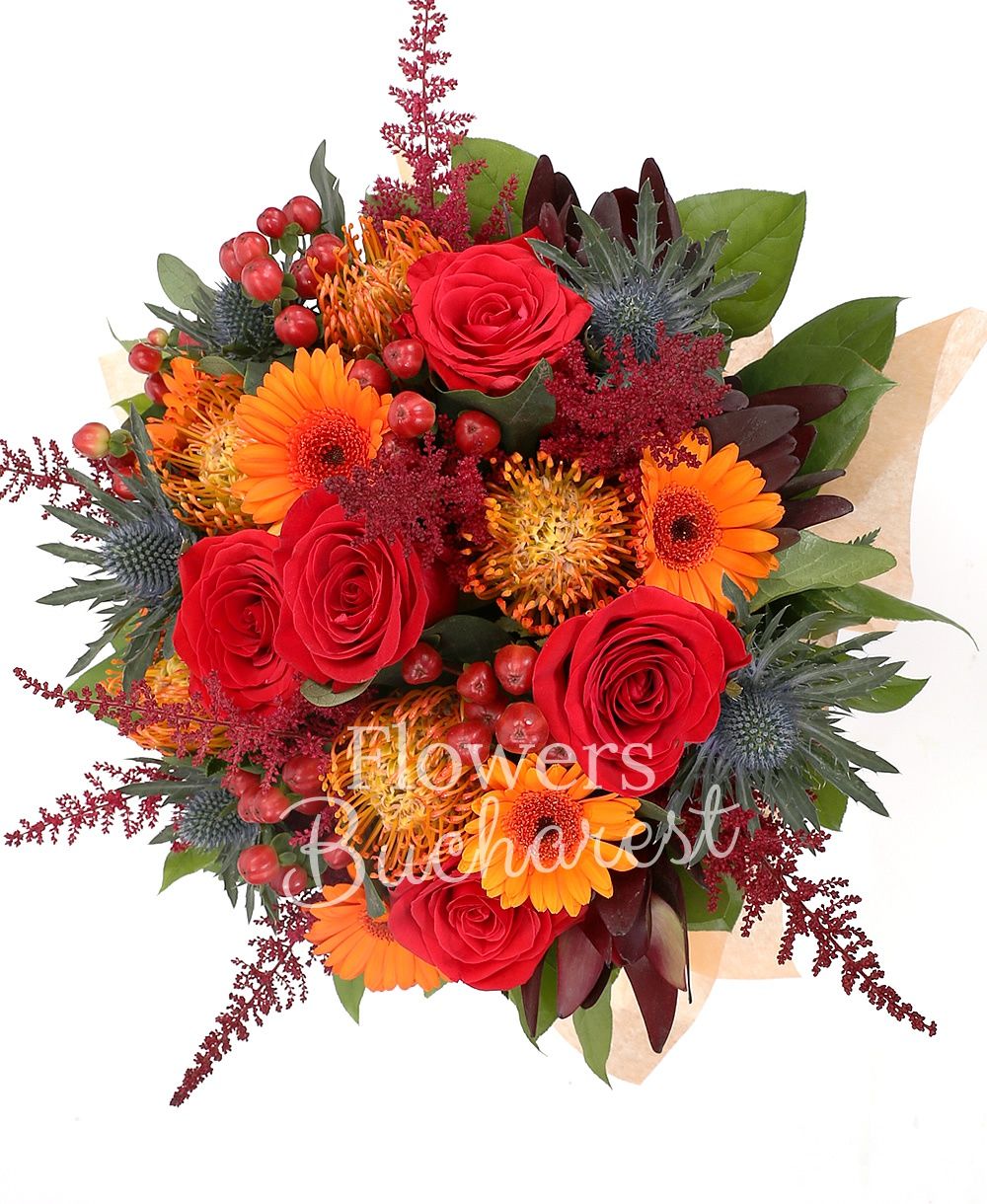 5 leucospermum, 3 eryngium, 8 astilbe, 7 orange gerberas, 7 red roses, 5 red hypericum, 5 leucadendron, greenery