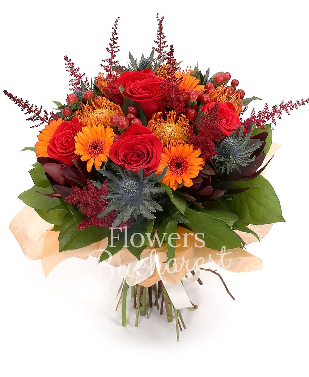 5 leucospermum, 3 eryngium, 8 astilbe, 7 orange gerberas, 7 red roses, 5 red hypericum, 5 leucadendron, greenery