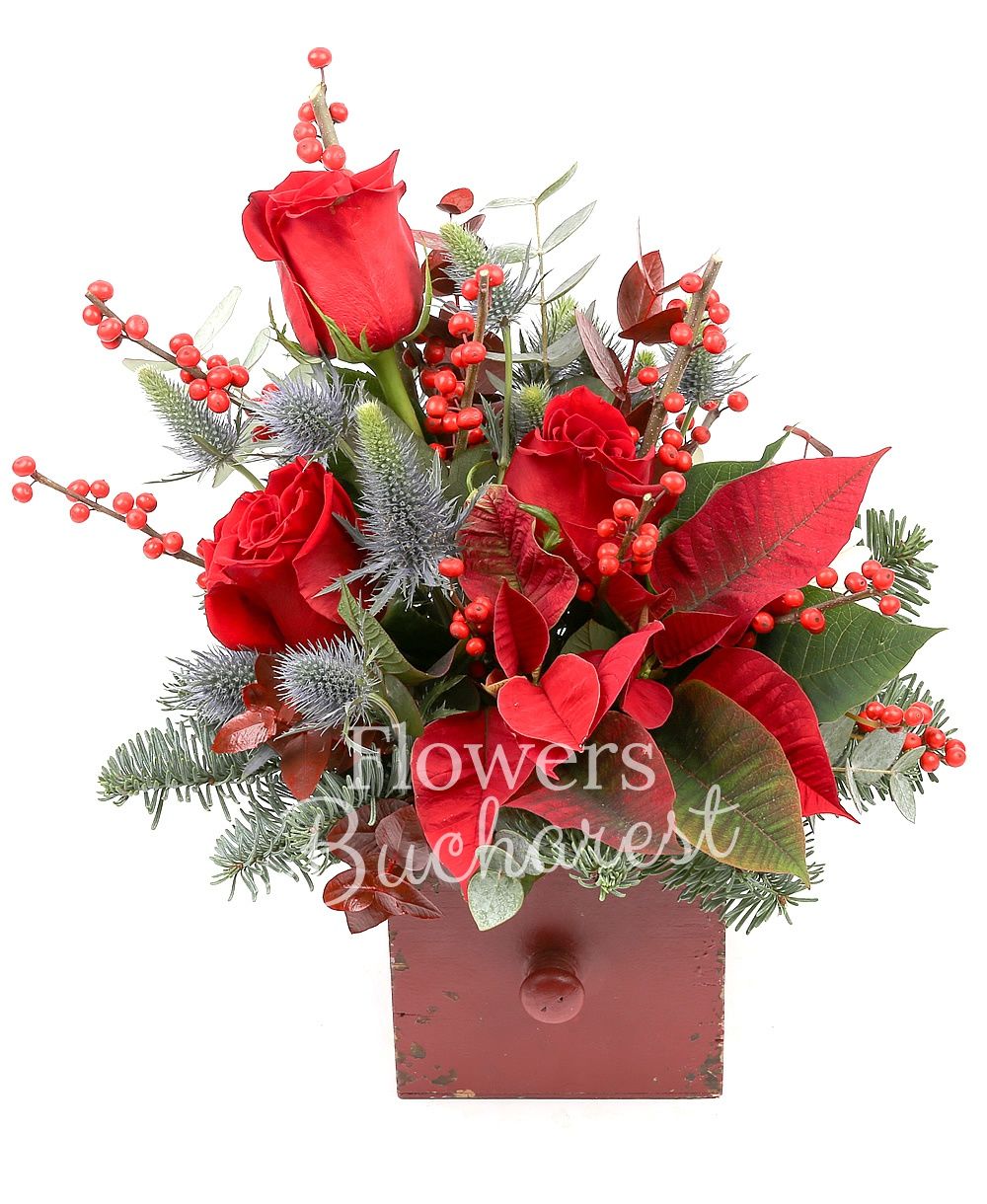 3 red roses, 3 white gerbera, poinsettia, 3 eryngium, ilex, greenery