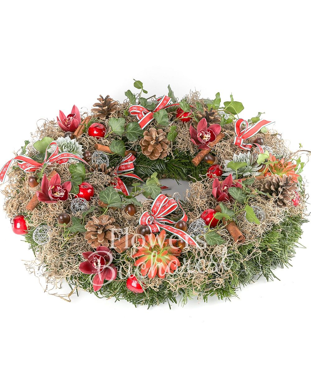 pink cymbidium, cinnamon, apples, 14 acorns, 10 silver globes, tillandsia, hedera, 6 bows, greenery