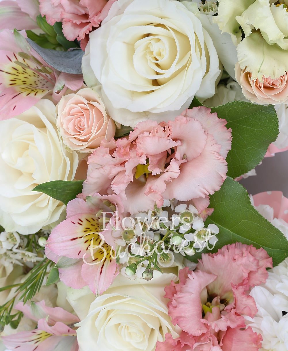 30 white chrysanthemums, 4 white roses, 2 pink alstroemerias, 2 pink miniroses, 3 pink lisianthus, greenery