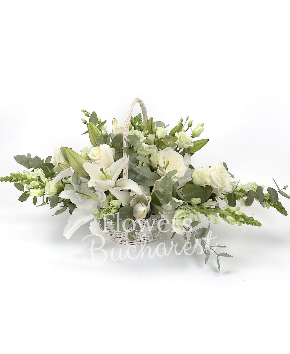 3 white lilies, 5 white roses, 7 white lisianthus, 7 white antirrhinum, greenery