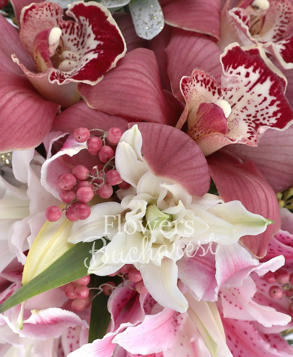 cymbidium, 2 pink lilies, 2 euphorbia, greenery