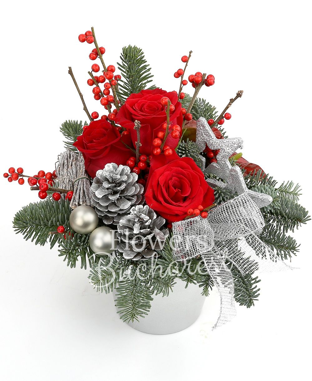 3 red roses, 2 red anthurium, globes, stars, sliced lemon slices, fir tree, greenery