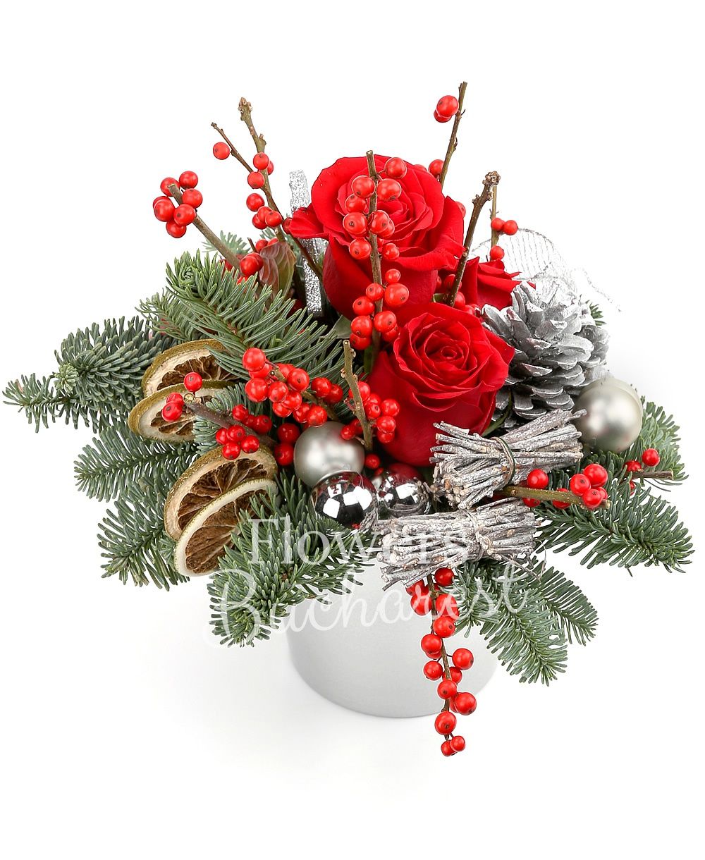 3 red roses, 2 red anthurium, globes, stars, sliced lemon slices, fir tree, greenery