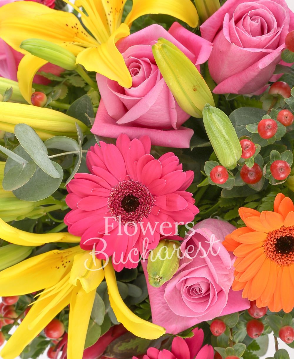 3 yellow lilies, 5 pink roses, 6 red hypericum, 3 cyclam gerbera, 2 orange gerbera, 2 proteea, greenery