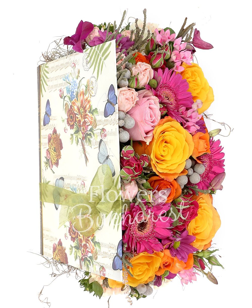 4 orange roses, 2 pink roses, 3 cyclam gerbera, 3 pink bouvardia, 3 cyclam miniroses, 2 pink miniroses, brunia, cyclam chrysanthemum, 5 cream carnations, book