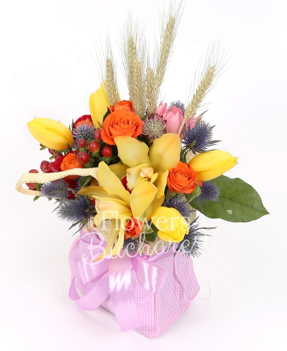 5 yellow tulips, 3 red roses, 2 orange miniroses, eryngium, yellow cymbidium