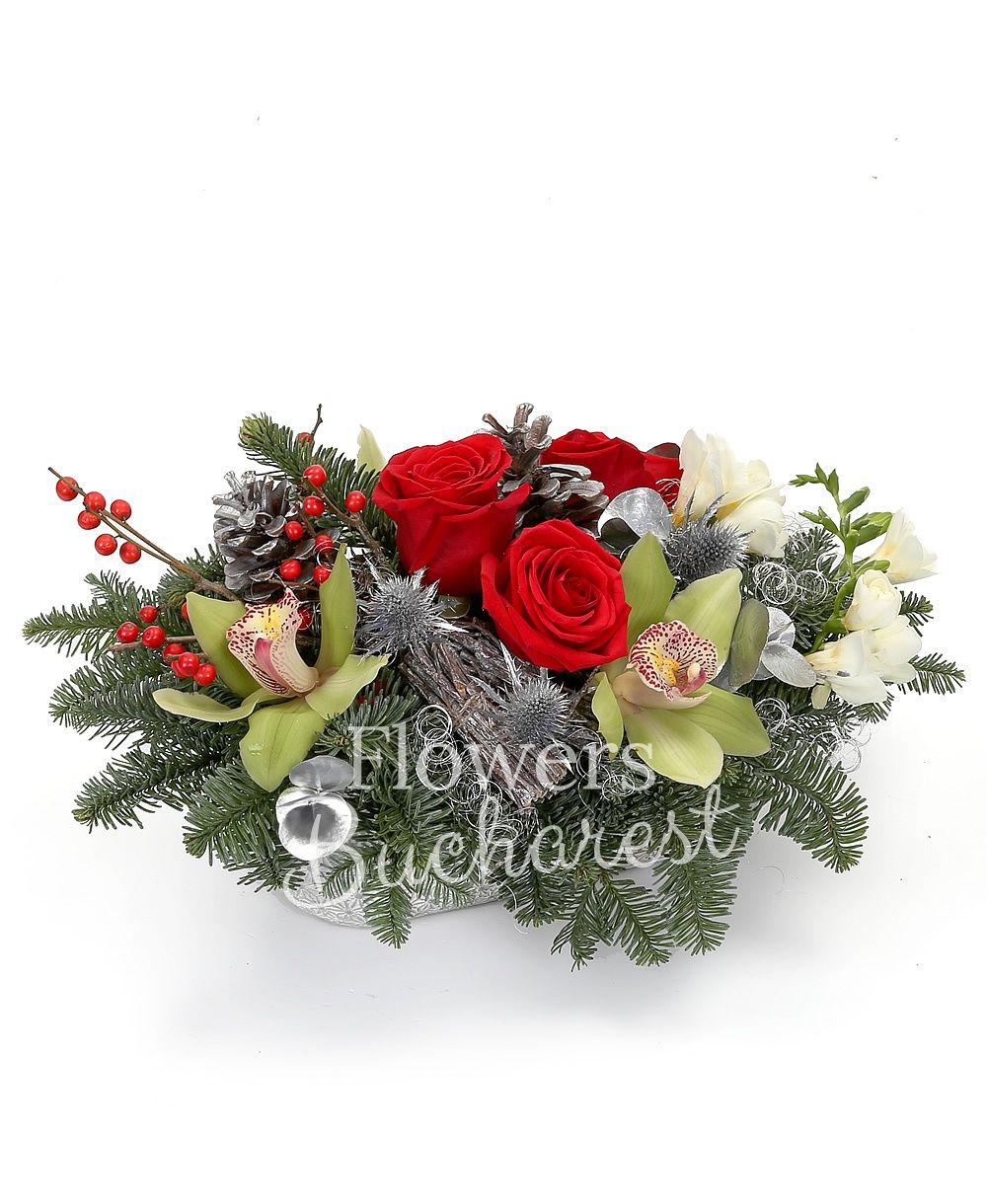 3 red roses, 5 freesias, green cymbidium, ilex, silver fir, eryngium, greenery, christmas decorations, ceramic vase