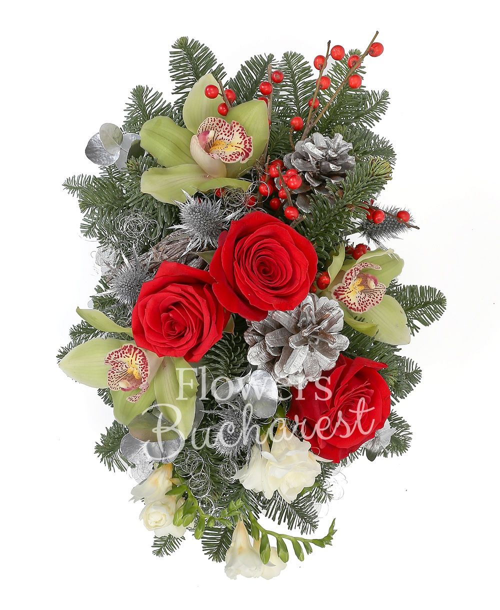 3 red roses, 5 freesias, green cymbidium, ilex, silver fir, eryngium, greenery, christmas decorations, ceramic vase