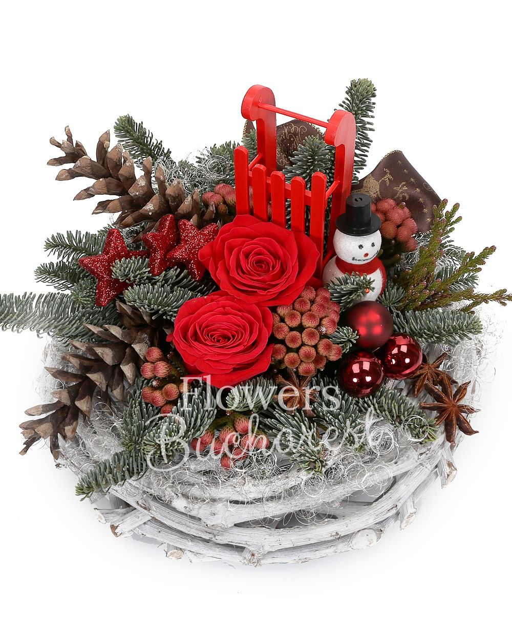2 red roses, 5 brunia, silver fir, christmas decorations, basket