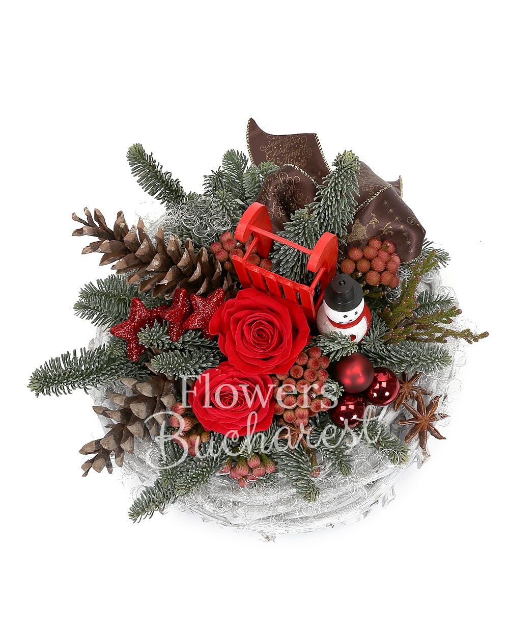 2 red roses, 5 brunia, silver fir, christmas decorations, basket