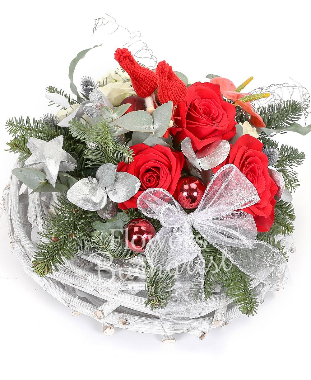 3 red roses, 3 white miniroses, 1 eryngium, 2 anthurium, silver fir, greenery, christmas decorations, basket