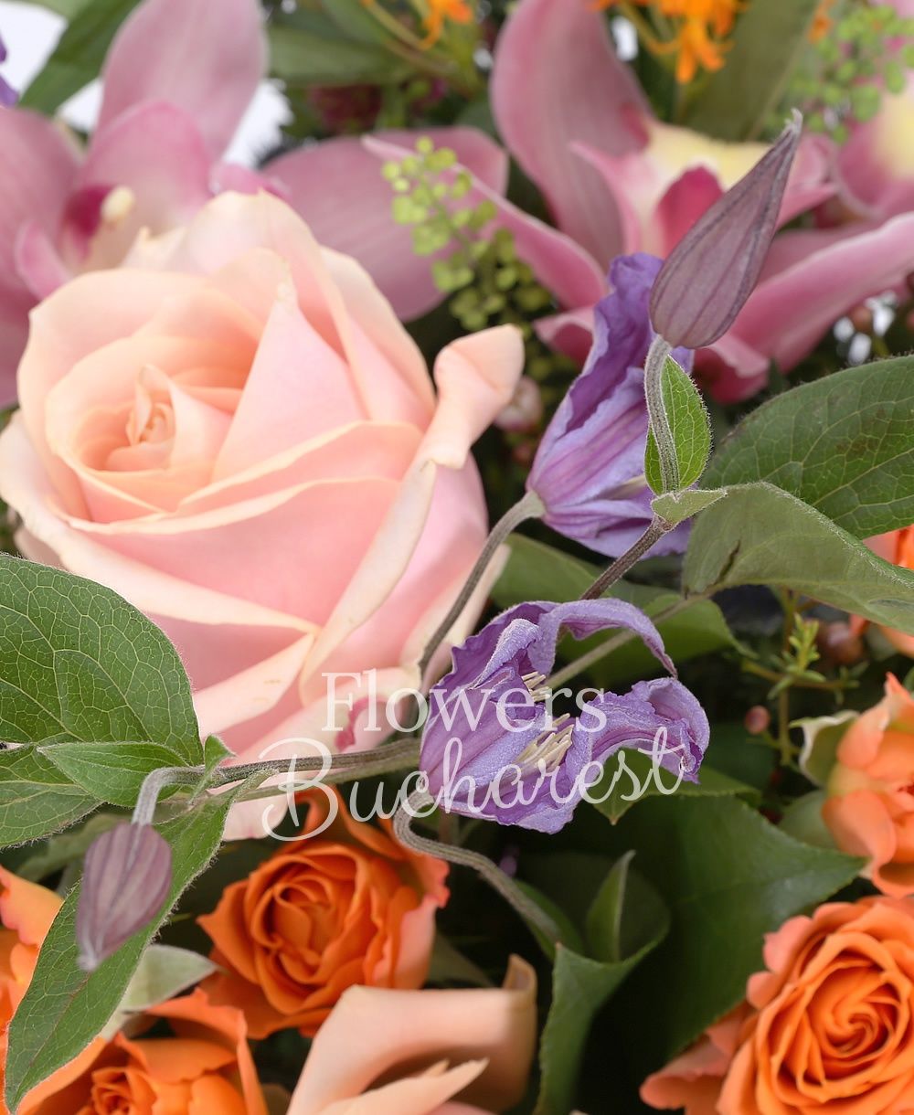 5 peach roses, 5 orange miniroses, 3 pink santini, 3 mauve clematis, 2 eryngium, 2 asclepias, greenery