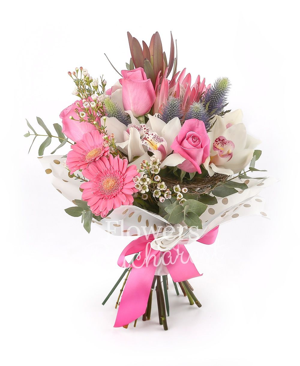 5 cyclam roses, 2 pink gerbera, 2 proteea, 2 leucadendron, 2 eryngium, white cymbidium, greenery