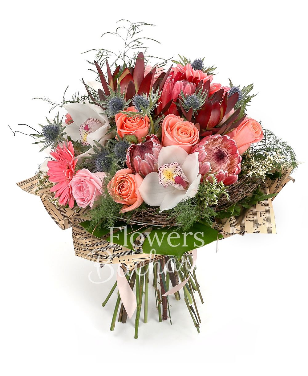 5 pink roses, 5 banana colour roses, 3 pink roses, 3 pink gerbera, 3 proteea, 3 leucadendron, 3 eryngium, white cymbidium, greenery