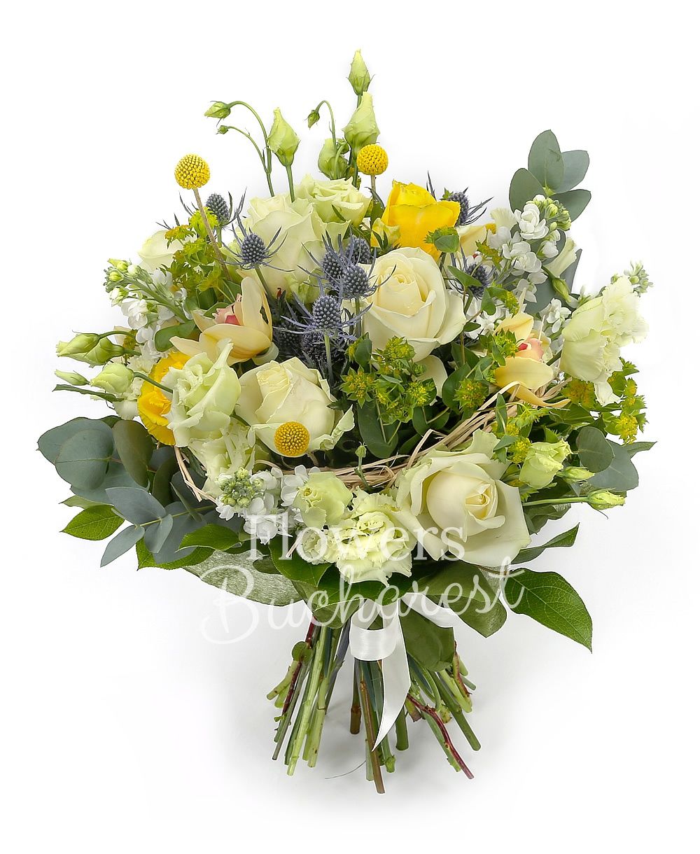 7 white roses, 3 yellow roses, 3 eryngium, 4 white lisianthus, 5 white matthiola, 3 craspedia, yellow cymbidium, greenery