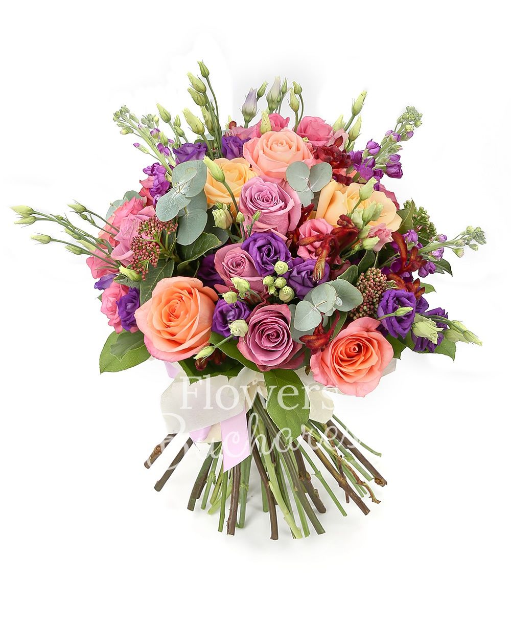 9 mauve roses, 5 banana colour roses, 5 pink roses, 5 mauve lisianthus, 5 mauve matthiola, 3 sedum, 3 anigozanthos, greenery