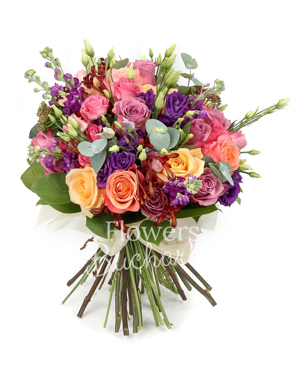 9 mauve roses, 5 banana colour roses, 5 pink roses, 5 mauve lisianthus, 5 mauve matthiola, 3 sedum, 3 anigozanthos, greenery