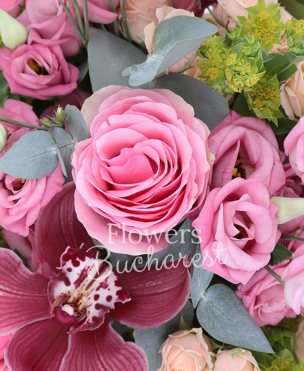 7 pink roses, 3 cream miniroses, 5 pink lisianthus, garnet cymbidium, greenery